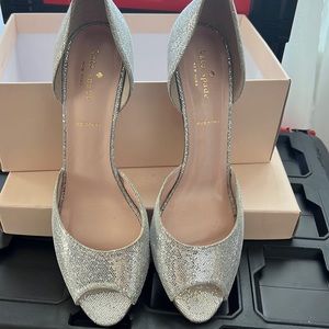 Kate Spade silver open toe D’orsay pumps. NWOT